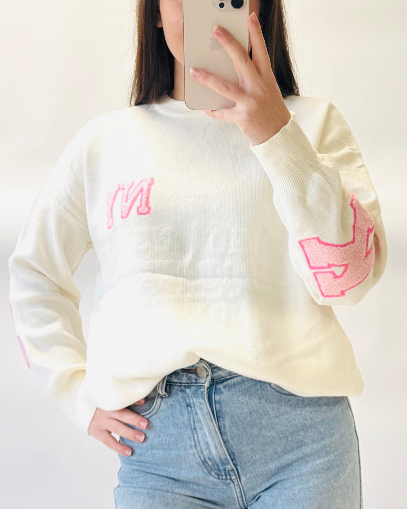 New york trui wit roze